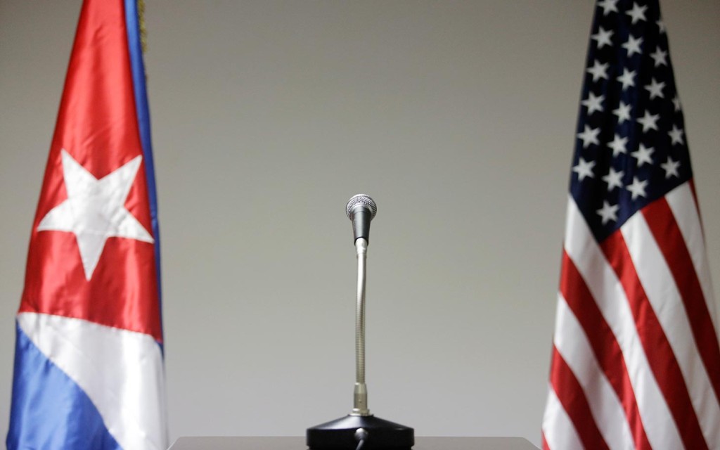 HAVANA, CUBA - JANUARY 22: A microphone is placed between the flags of the US and Cuba in the press briefing room during the first round of talks with the US government to discuss diplomatic recognition, at the Palacio de las Convenciones, on January 22, 2015 in Havana, Cuba.  Roberta Jacobson, U.S. Assistant Secretary of State for Western Hemisphere Affairs, is the highest ranking government official to visit Cuba since the Jimmy Carter era. Talks between the US and Cuba take place only weeks after President Obama and Cubas President Raul Castro announced they would re-establish diplomatic relations, on December 17, 2014. Cubas revolution leader Fidel Castro, who has not been seen in public since January 8, 2013, has not published